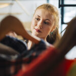 ginger-woman-clothes-rack